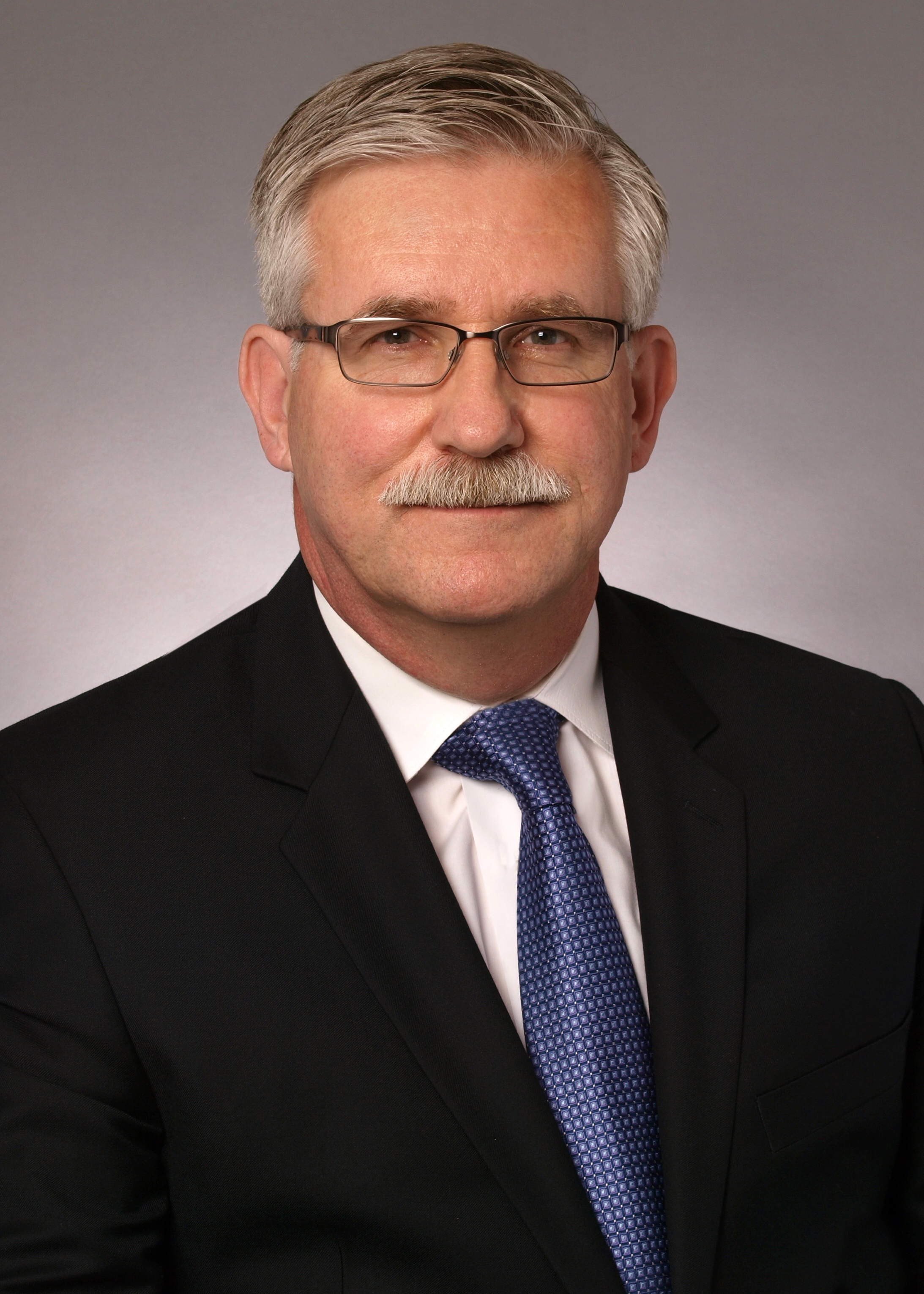 Headshot_Charneski_C_Brinks