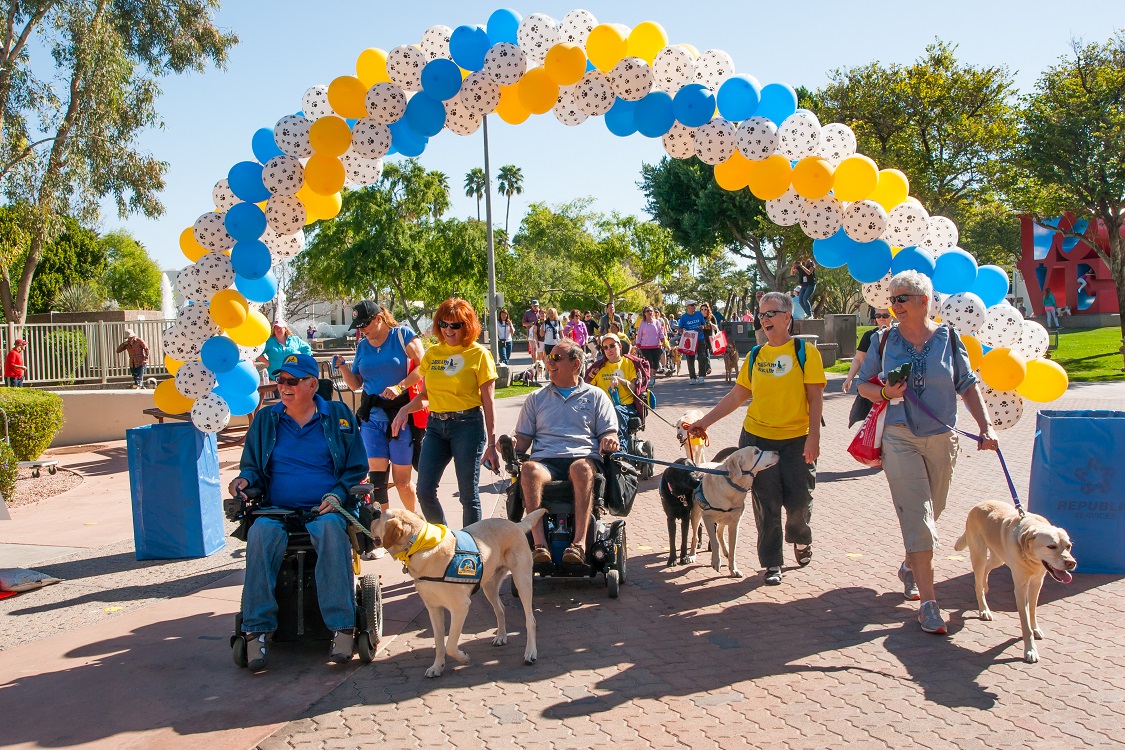 Dog Fest Walk N' Roll Group under arch