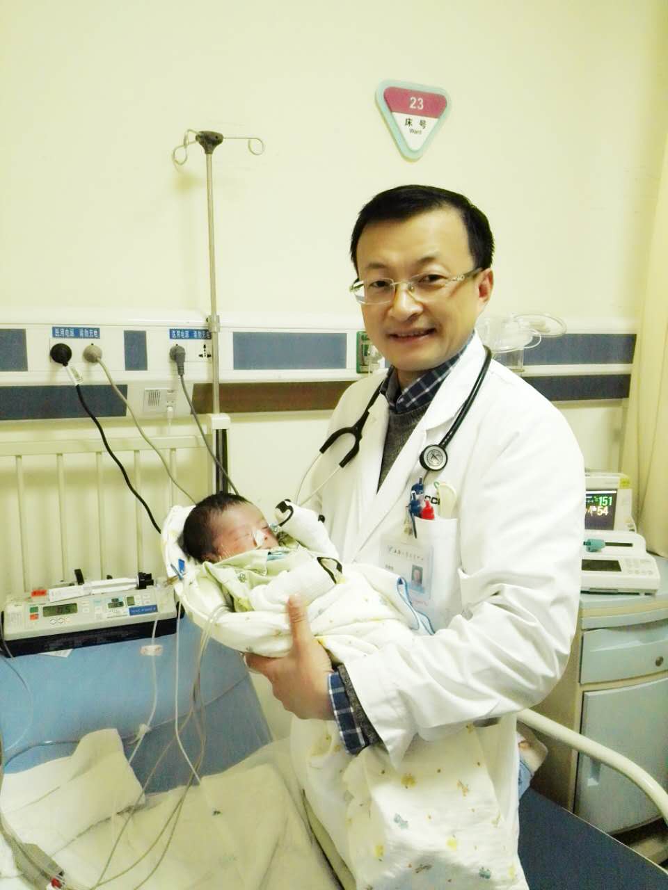 Dr. Zheng Jinhao with baby Xiao Ji at SCMC